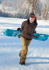 Fototapeta na wymiar Woman with snowboard