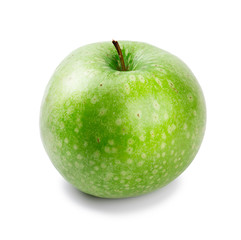 Ripe and juicy green apple a shank upwards isolated on a white