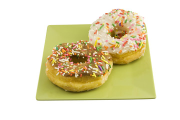 two sprinkled doughnuts