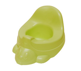 Green plastic potty isolated on a white background.