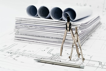 Project blueprints and measurement tool on paper