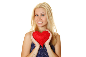 Young woman holding red heart