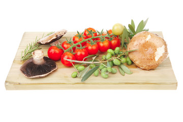 raw vegetables on wooden board