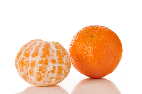 tangerines, peeled and whole