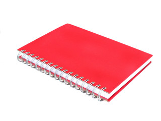 red notebook on white background