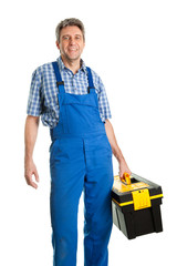 Confident service man with toolbox