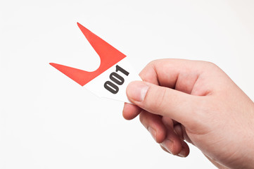 Man holding a turn ticket