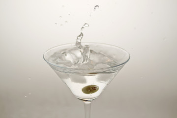 Olive in the cocktail