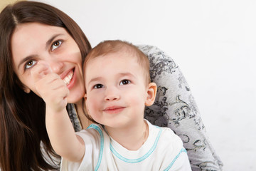 young mother having fun with her little son
