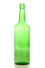 Whiskey bottle against white