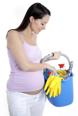 Woman holding cleaning products