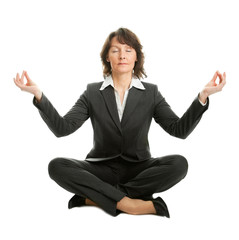 Businesswoman sitting in lotus position