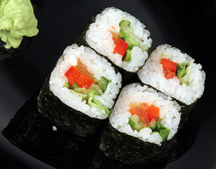 Maki sushi. Japanese cuisine on white