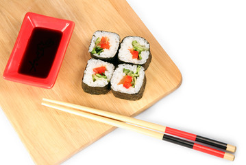 Maki sushi. Japanese cuisine on white