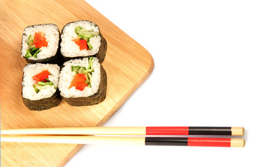 Maki sushi. Japanese cuisine on white