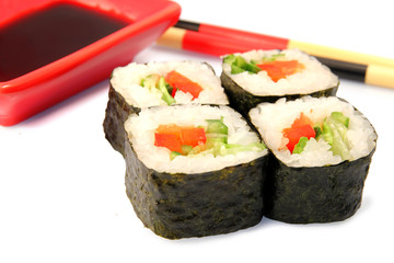 Maki sushi. Japanese cuisine on white