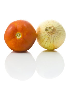 Onion and tomato isolated on white background