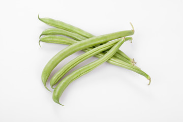 Green, french beans on white,  clipping path