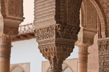 Stonework on the columns of Alhambra - obrazy, fototapety, plakaty