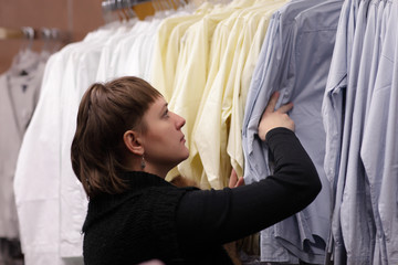 Woman chooses blouse