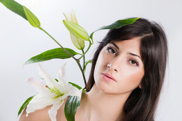 Beautiful woman with lily