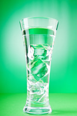Water in the glass against gradient background