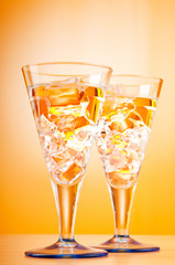 Water in the glass against gradient background