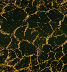 gold cracks on the black background