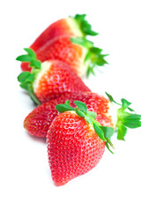 big juicy red ripe strawberries  isolated on white