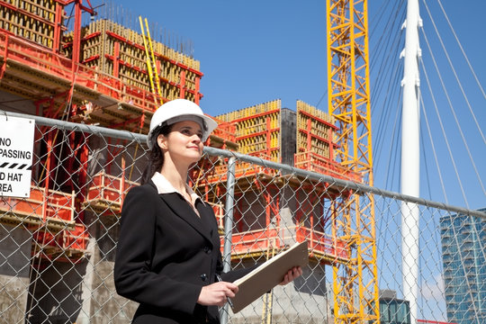 Woman working on downtown construction site