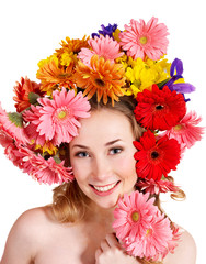 Young woman with  with flowers on her  hair.