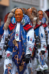 Fototapeta na wymiar Mask parade at the historical carnival in Freiburg, Germany