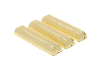 Chocolate Wrapped in Golden Foil Isolated on White Background