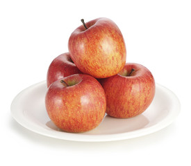 Apples on white plate