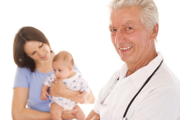 doctor and a woman with a newborn