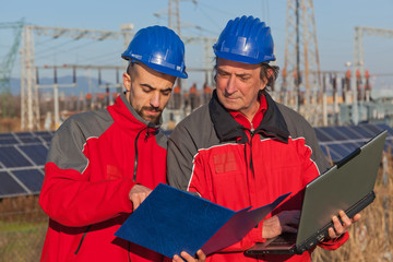 Engineers at Work In a Solar Power Station