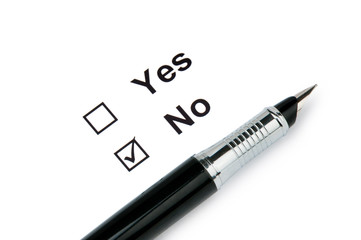 Check boxes and pen isolated on the white