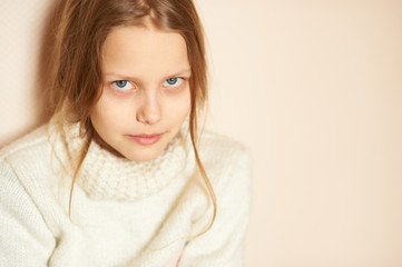 Portrait of a sad little girl, shallow DOF