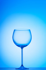 Wine glasses against gradient background