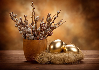 Obraz na płótnie Canvas Wielkanoc - Złote jaja w gnie¼dzie