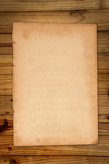 Empty white Crumpled paper on wood table vertical
