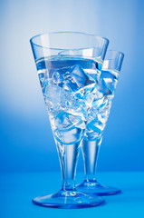 Water in the glass against gradient background