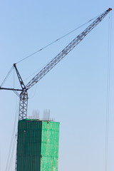Building crane lead at a building bridge footing