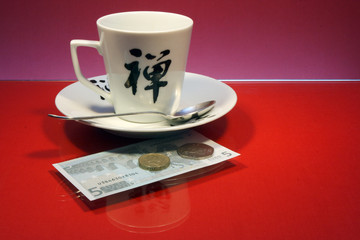 Tip on a red glass table