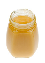 A jar of honey isolated