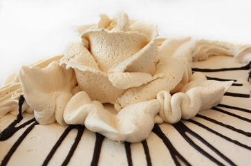 Flower of cream on cake