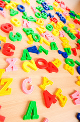 Fototapeta premium Children letters and digits on the table