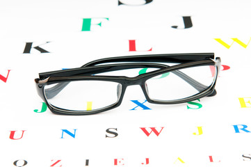 Optical reading glasses on the eyesight table