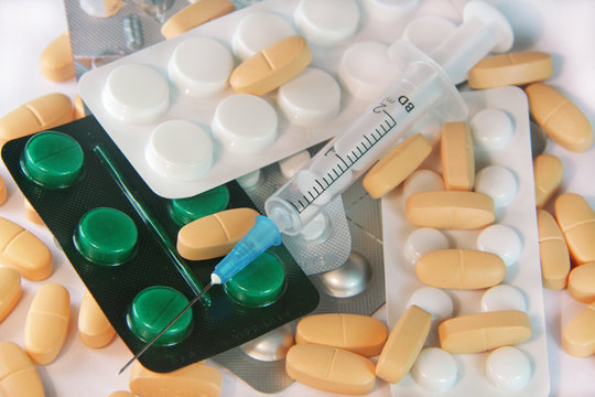 Medical syringe and pills