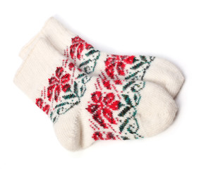 winter knitted woolen socks isolated on white background